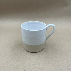 stoneware mug with natural and white overlapping glaze
